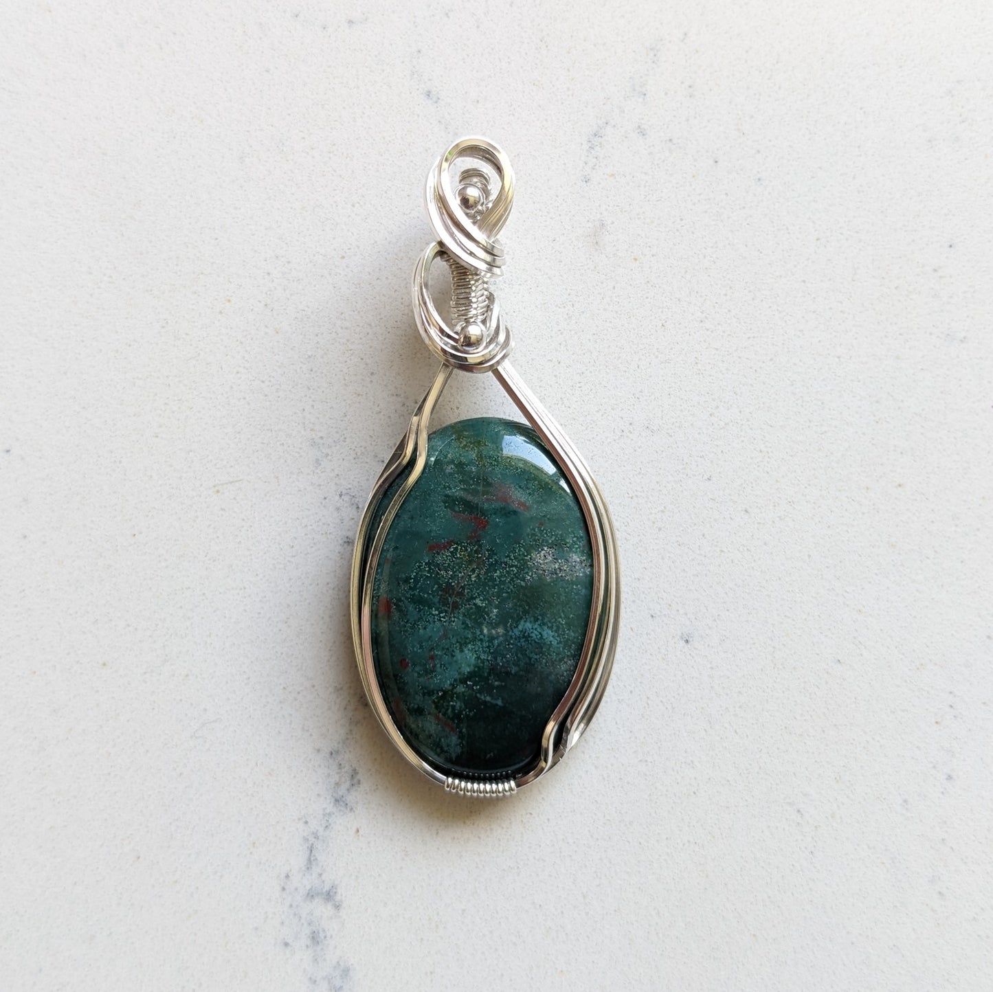 Bloodstone wrapped in Sterling Silver